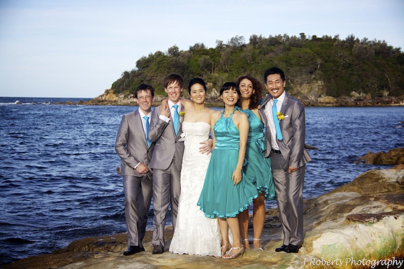 Bridal party at beach - wedding photography